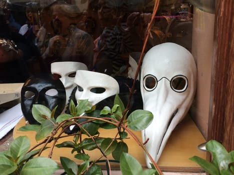 High quality photo. Venetian carnival masks in a shop window
