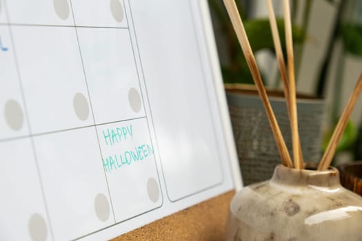 HAPPY HALLOWEEN on calendar to remind important event appointment Monthly PLANNER. Magnetic board with the days of the month. Place to enter important matters schedule. Concept for business planning. Whiteboard Planner magnetic monthly template