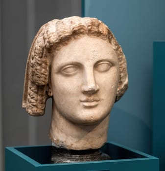 Sculpture bust A qween with the curles of Isis in Berlin museum