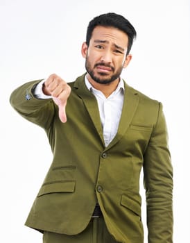 Thumbs down, business man and sad portrait in a studio with bad feedback, voting and emoji hand sign. Negative opinion, decision and wrong hands gesture of a upset male with isolated white background