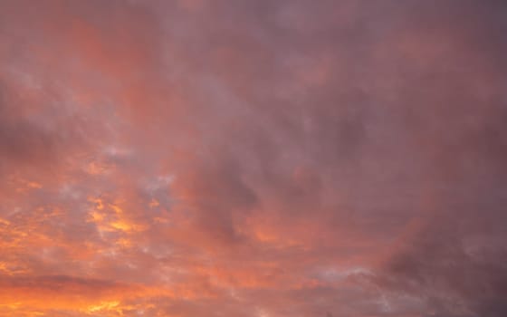 Sky with red-colored clouds