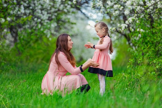 mother and daughter in nature