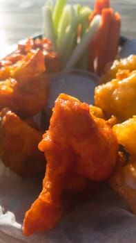 Vegan Cauliflower Buffalo Wings With Ranch Sauce And Vegetable Sticks