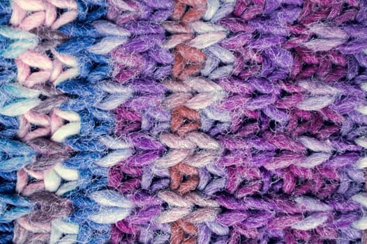 Organic knitting background with macro wool threads.