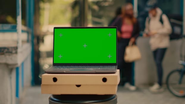 Laptop advertising greenscreen template outside