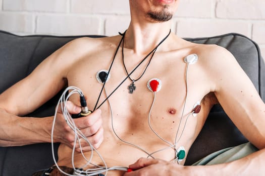 Holter Heart Monitor. man with cardio monitor