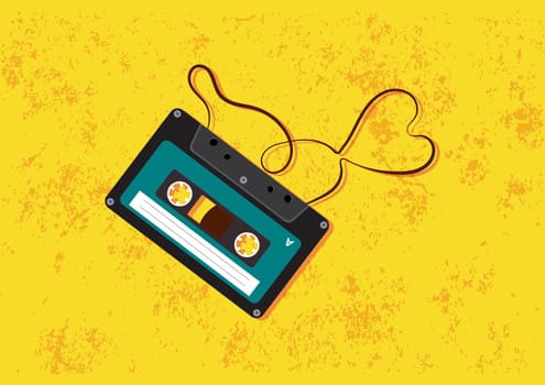 Retro cassette tape isolated on yellow background