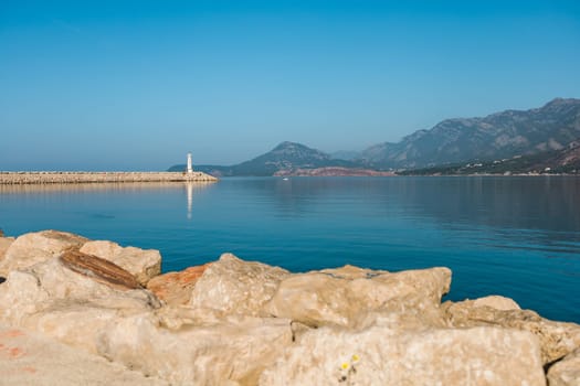 Small lighthouse in mediterranean sea in Montenegro