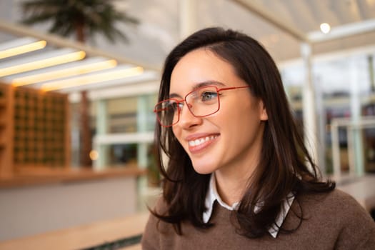 Middle age beautiful businesswoman wearing glasses