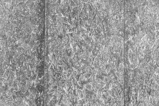 Black and white surface paint on the press wood texture of the chipboard background