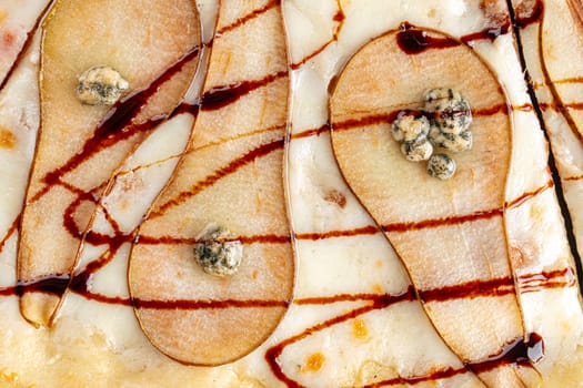 Gourmet pizza with pear and gorgonzola cheese