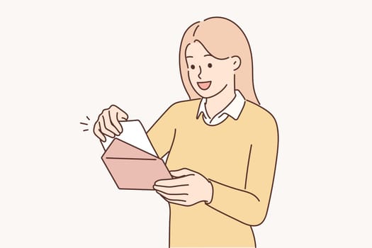 Positive woman with envelope received invitation to wedding ceremony of friends or colleagues
