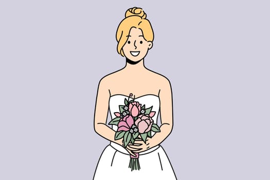 Smiling woman in wedding dress and bridal bouquet