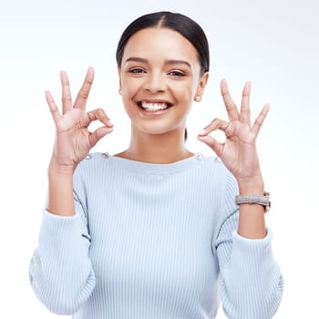 Portrait, hands and perfect sign by woman in studio for okay, agree and positive review on white background. Face, like and happy girl with emoji hand for success, vote and support or yes isolated
