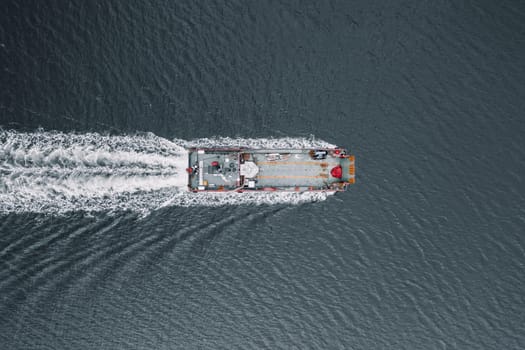 A barge ship is seen from a bird's eye view