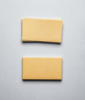 Blank golden business card on grey background