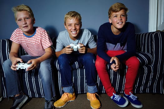 Im taking you guys down. young boys playing video games.
