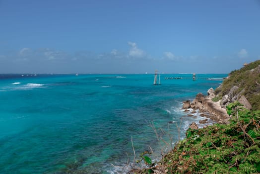 The coastline of the Caribbean Sea with white sand and rocks