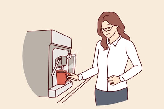 Businesswoman pouring coffee into mug from espresso machine during lunch break in office