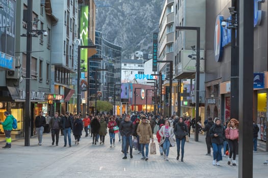 Andorra La Vella, Andorra : 2023 Aprill 15 : People Walk in the Comercial Street named Meritxell. Andorra la Vella, Andorra in winter.