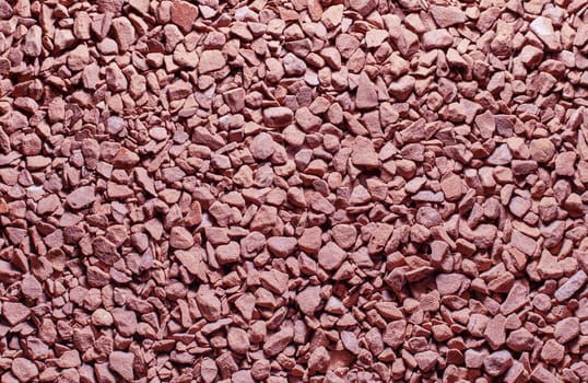 Pebbles sand pink coffee texture macro background