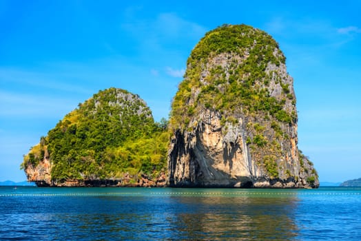 Huge cliff rock in azure water, Ko Rang Nok, Ao Phra Nang Beach, Ao Nang, Krabi, Thailand