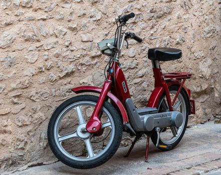 vintage piaggio scooter hi red color