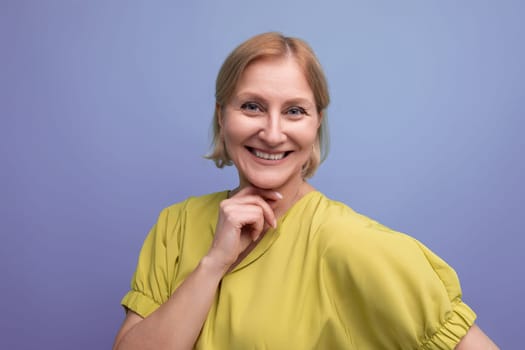 horizontal closeup of happy middle aged woman in casual outfit