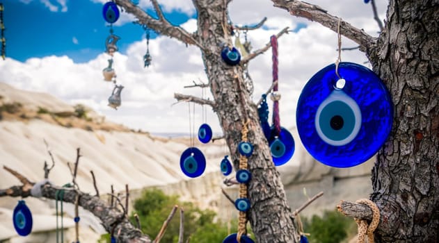 Amulets from evil eye hanging on tree