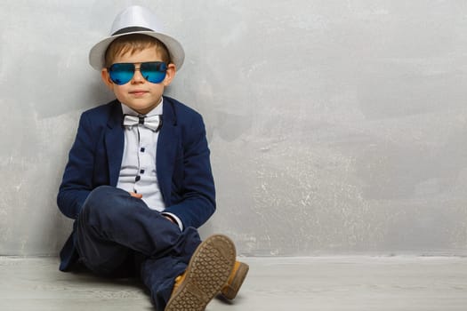 stylish little boy. Little child in glasses. Success, bright idea