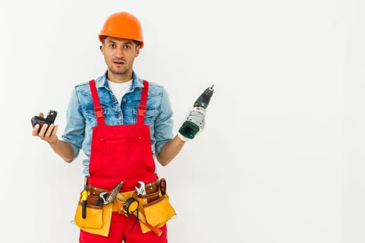 Construction worker with helmet and screwdriver