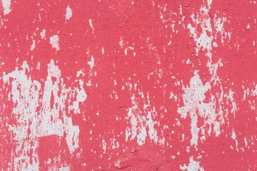 Red peeling paint abstract color pattern design worn weathered white wall surface texture background