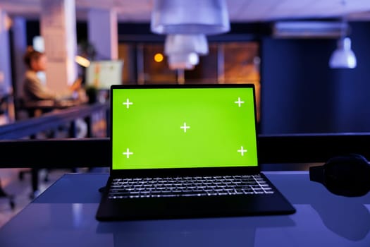 Laptop computer with green screen mock up chroma key with isolated display