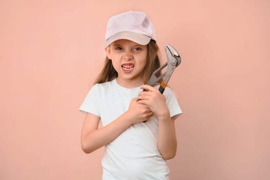 When dad wanted a son, but he is raising a daughter. Girl tomboy with a wrench