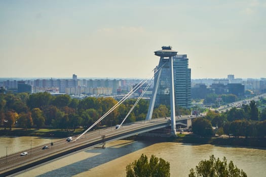 Slovakia, Bratislava - October 8, 2022: Top view of the Bridge of the Slovak National Uprising and the Danube River. High quality photo
