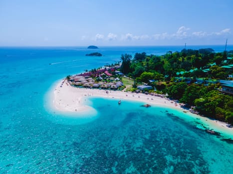 Koh Lipe Island Southern Thailand with turqouse colored ocean and white sandy beach at Ko Lipe