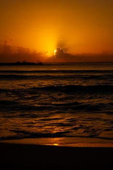 Sea beach with sky sunset or sunrise. Clouds over the sunset sea.
