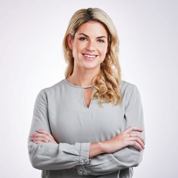 Happy, crossed arms and portrait of business woman on white background with happiness, smile and success. Corporate, professional and face of female person with confidence, pride and career in studio