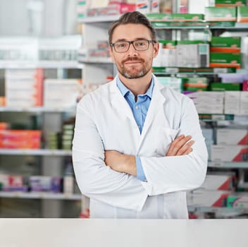 Ill be with you in sickness and in health. Portrait of a pharmacist working in a drugstore. All products have been altered to be void of copyright infringements.