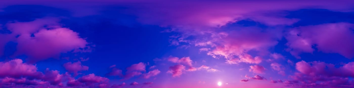 Blue sky panorama with magenta Cirrus clouds in Seamless spherical equirectangular format. Full zenith for use in 3D graphics, game and editing aerial drone 360 degree panoramas for sky replacement.