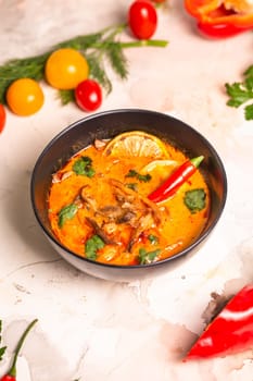 asian spicy tom yam soup with hot pepper and seafood
