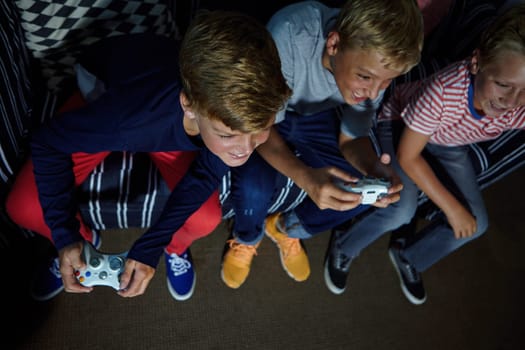 Gaming late into the night. young boys playing video games.