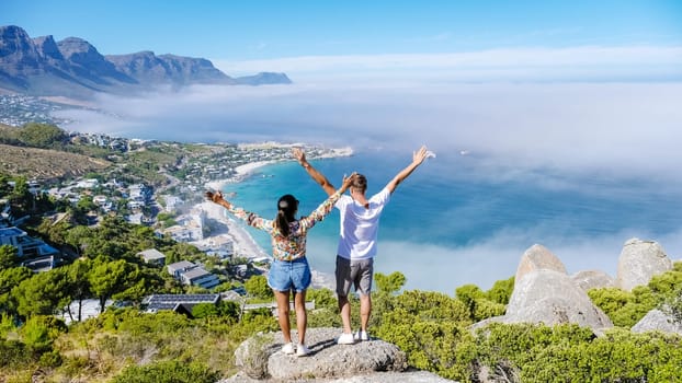 The Rock viewpoint in Cape Town, Camps Bay with fog over the ocean in Cape Town South Africa