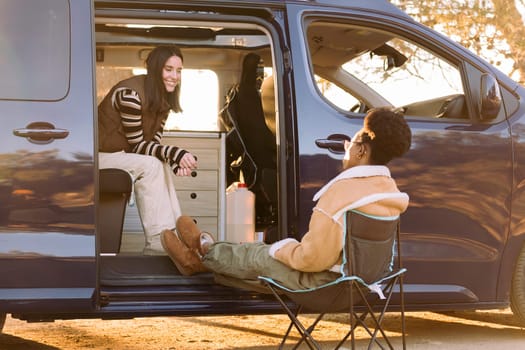 women chatting and having fun in a camper van
