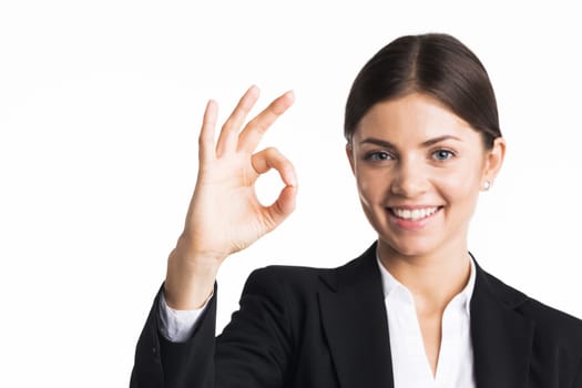 Businesswoman showing OK sign