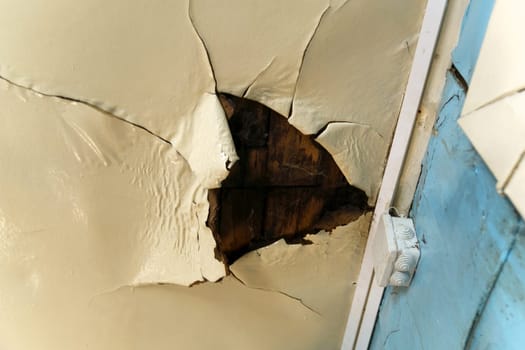 Broken ceiling problem in house because rain water damage in raining season.