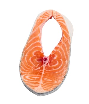 Raw salmon steak on a white isolated background