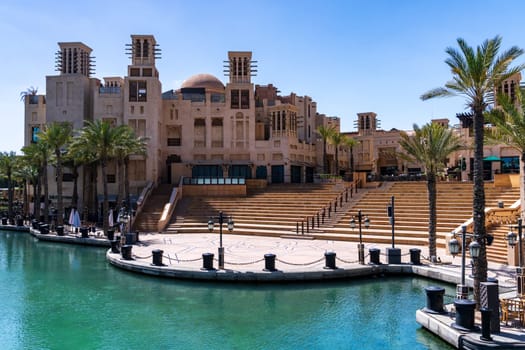 Dubai, UAE - 2 April 2023: Entrance and theater into the shopping mall called Souk Madinat Junction