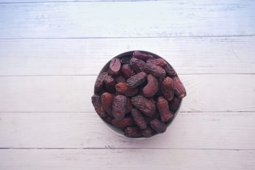 close up of fresh date fruit in a bowl on table