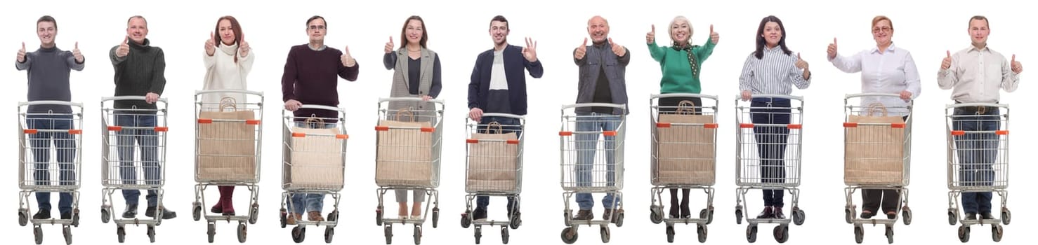 group of people with shopping cart showing thumbs up